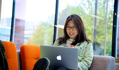 Female student with a laptop